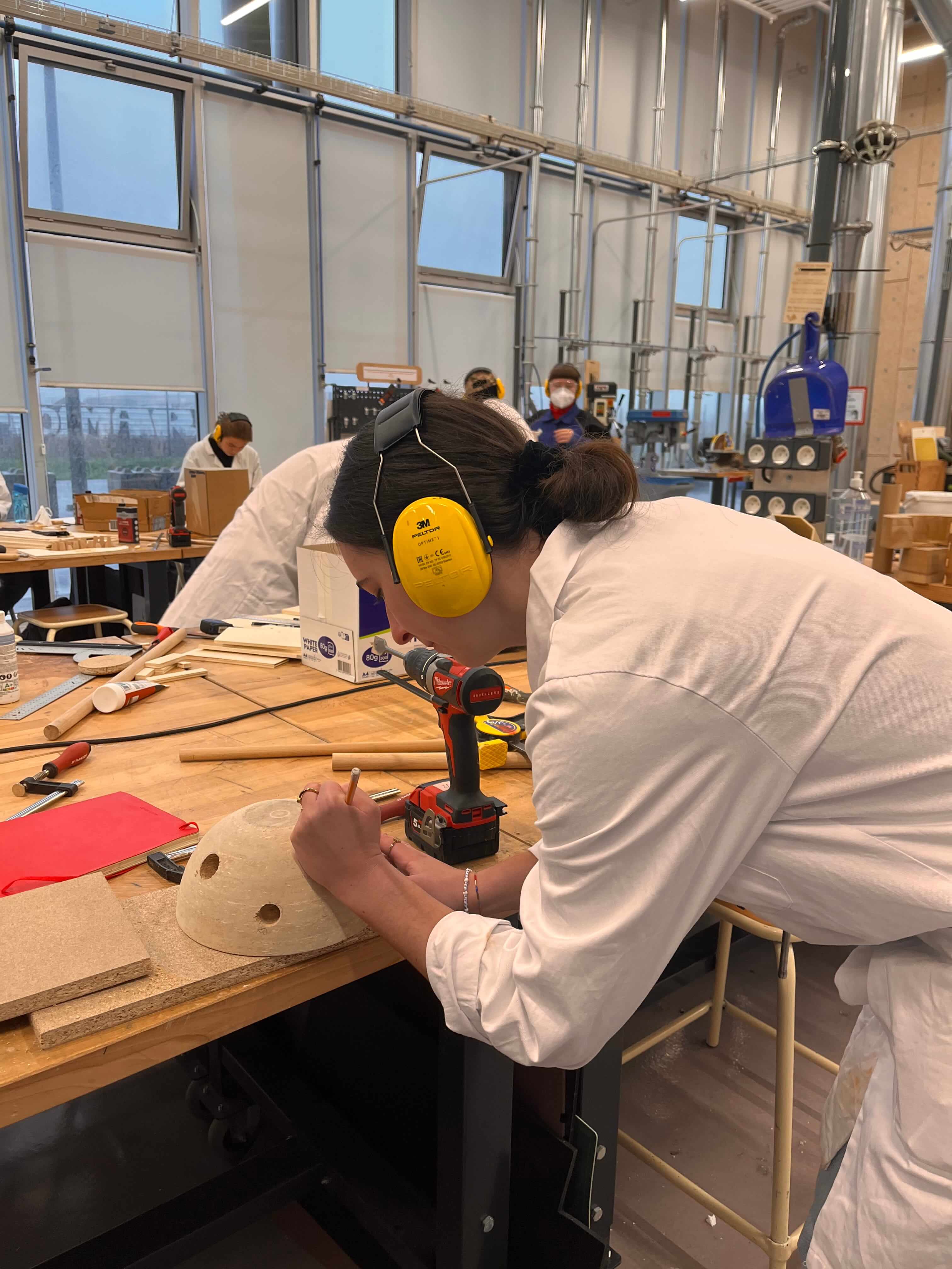 Wooden rocket toy with bead maze detail