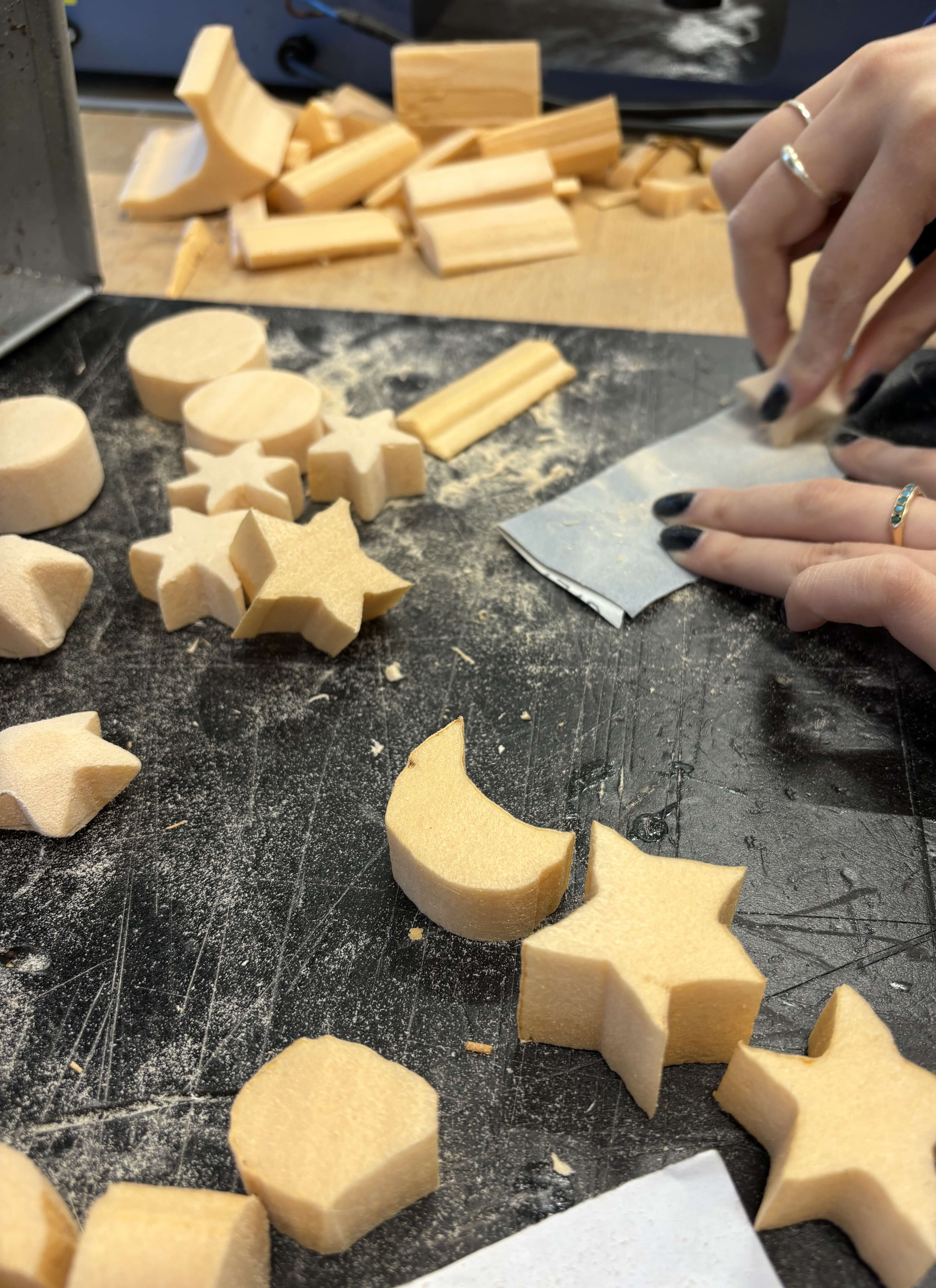 Rocket toy prototype photographed in a workshop setting