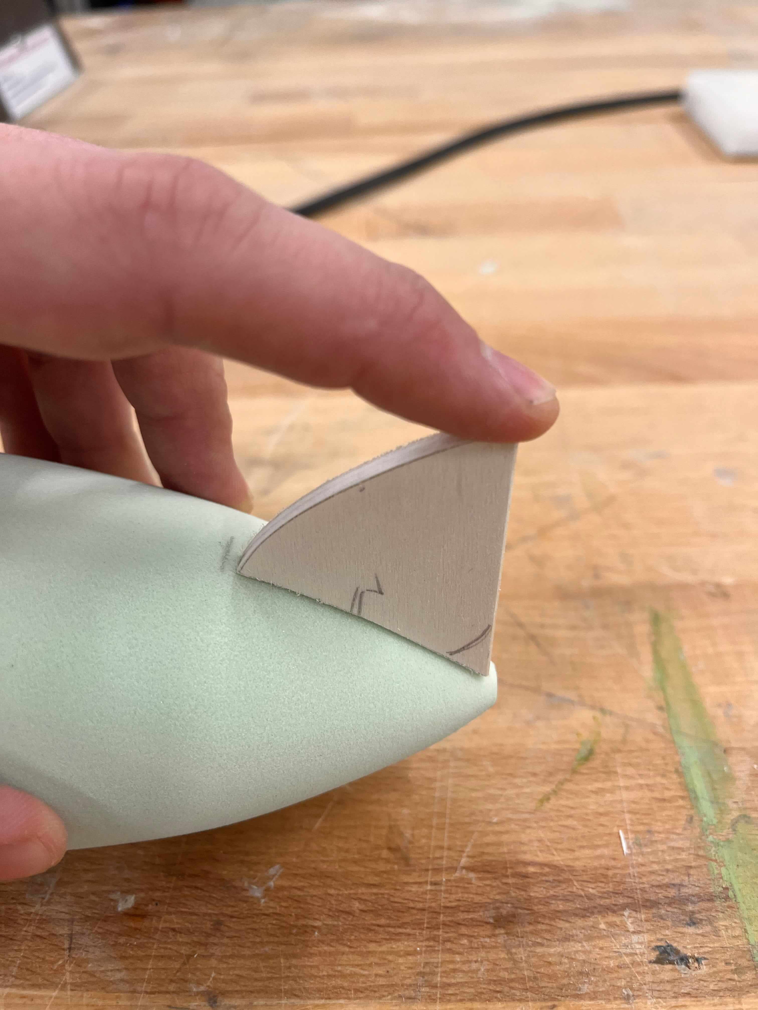 Rocket toy photographed from above with stacked components