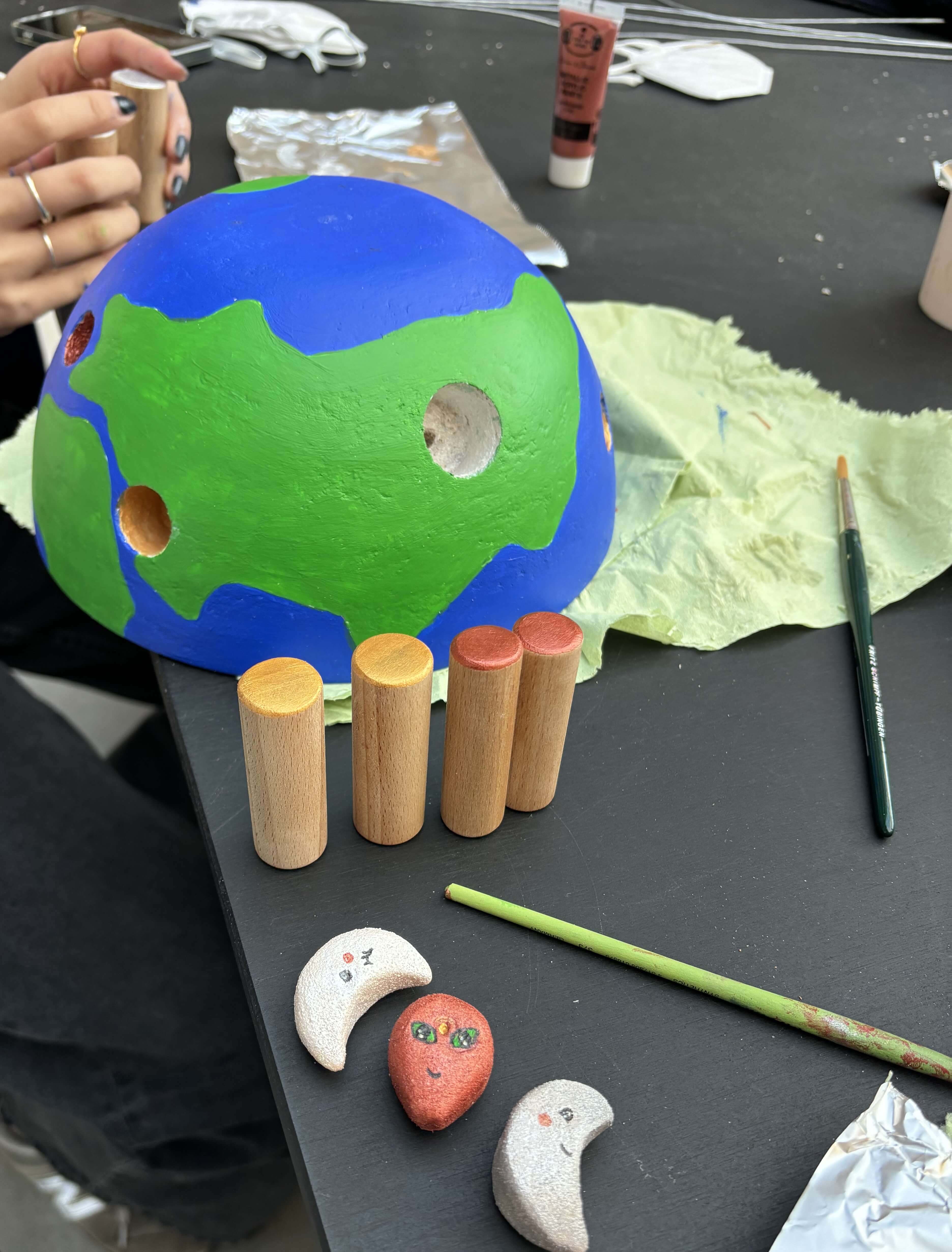 Rocket toy detail showing painted windows and openings