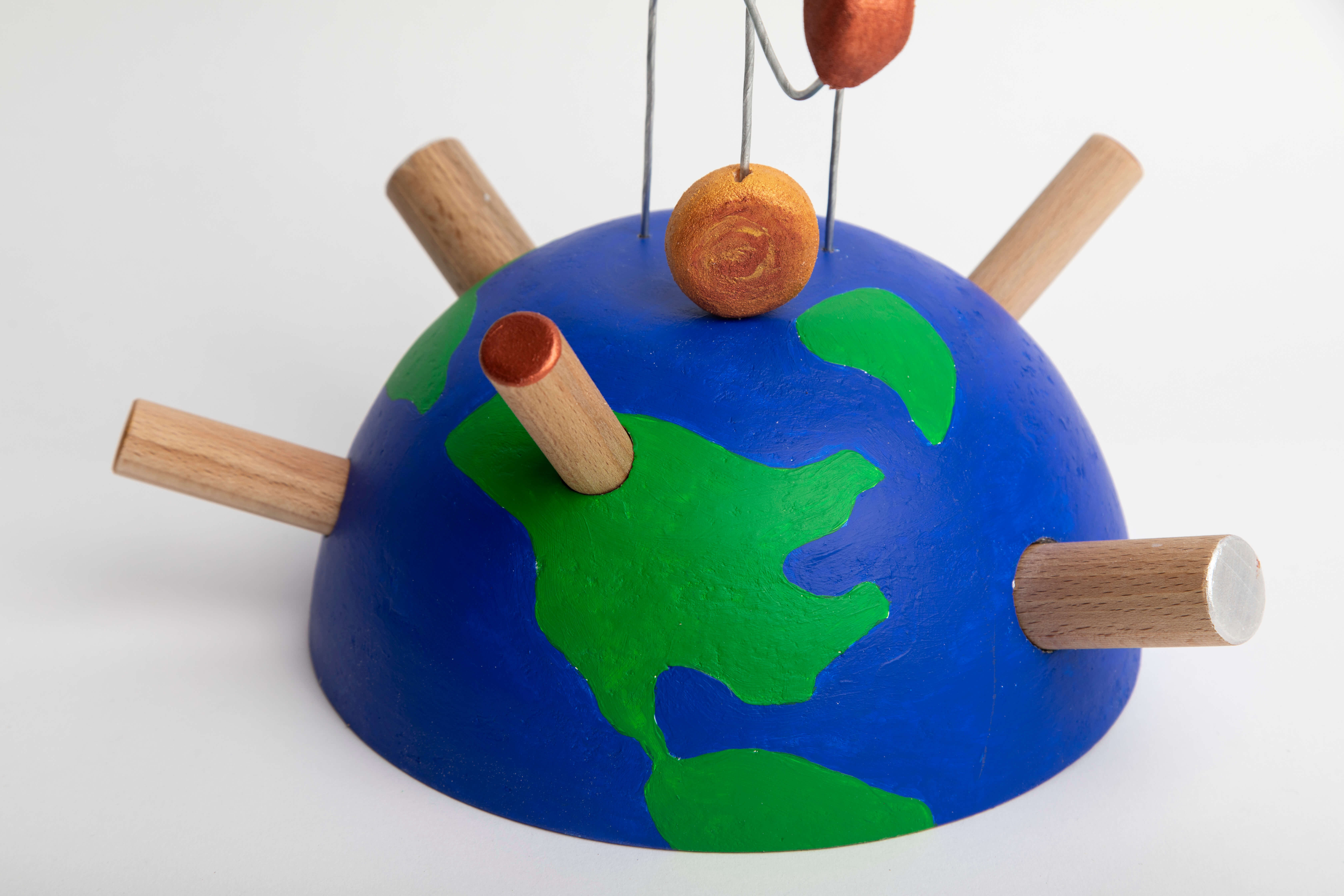 CAD model and construction sketches for the rocket toy