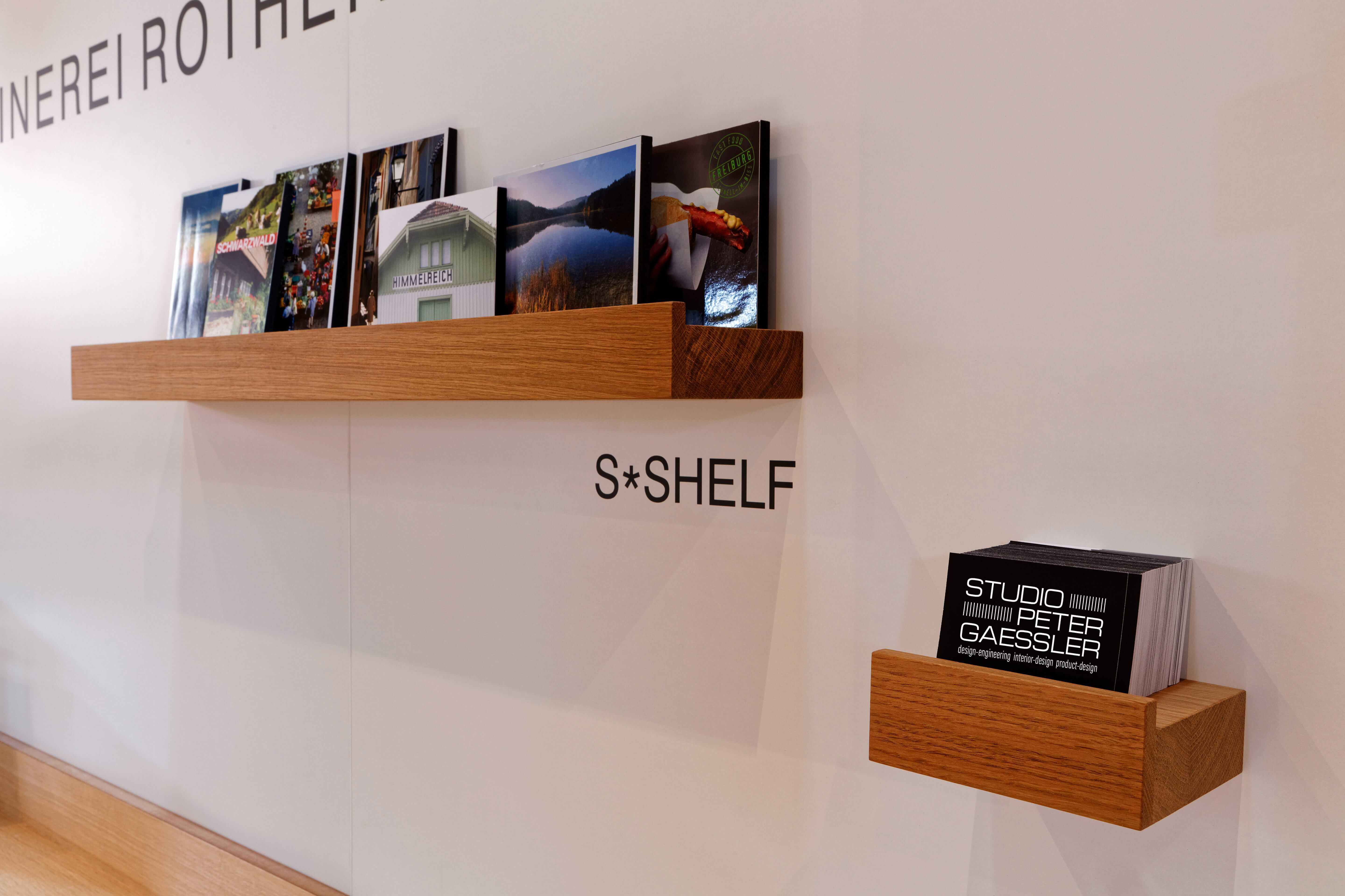 Printed SPG materials arranged on a black background