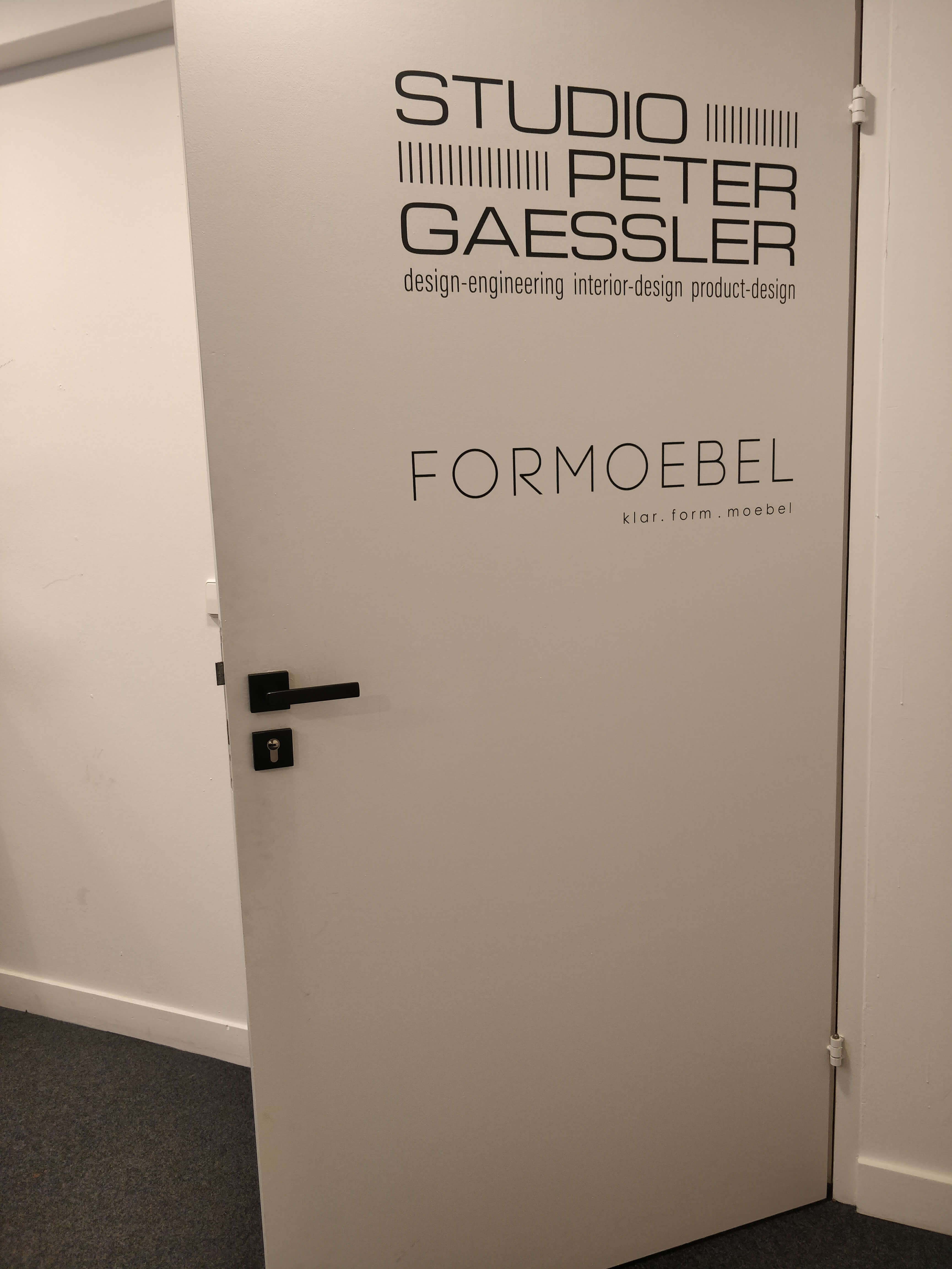 SPG stationery detail with typography and logo